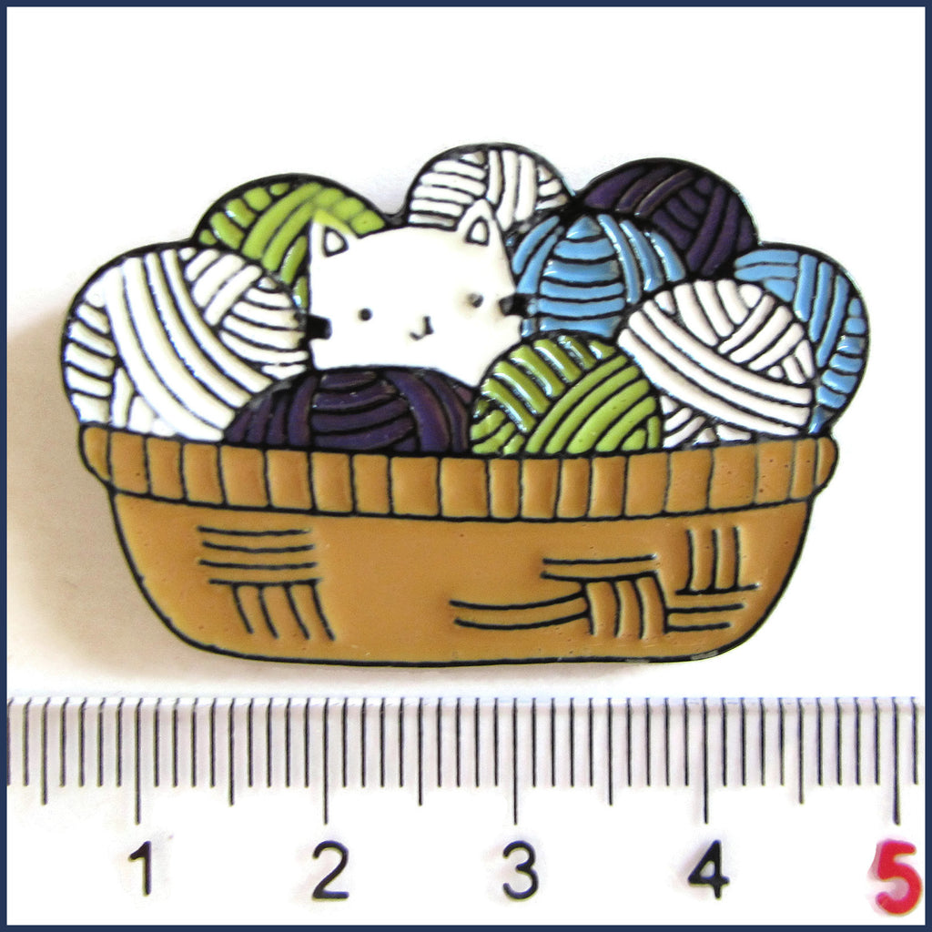 kitten in a basket of yarn badge pin with ruler