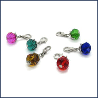 six colourful glass stitch markers