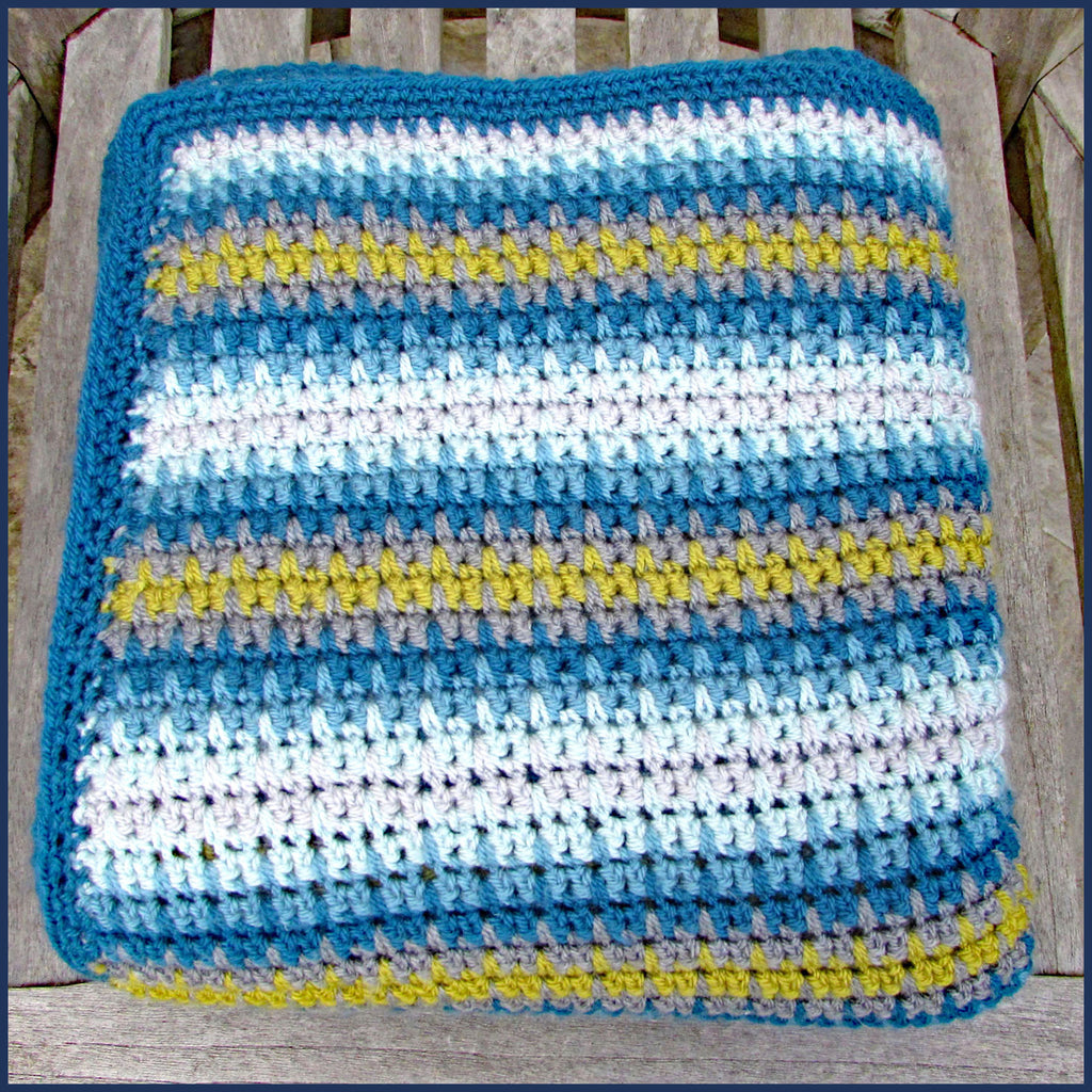 stripey crochet blanket folded