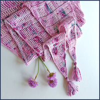 pink crochet shawl with flowers
