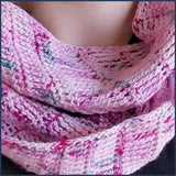 girl wearing pink crochet shawl