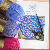 crochet pattern with hook and scissors