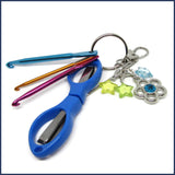 crochet travel kit with blue scissors and mini crochet hooks
