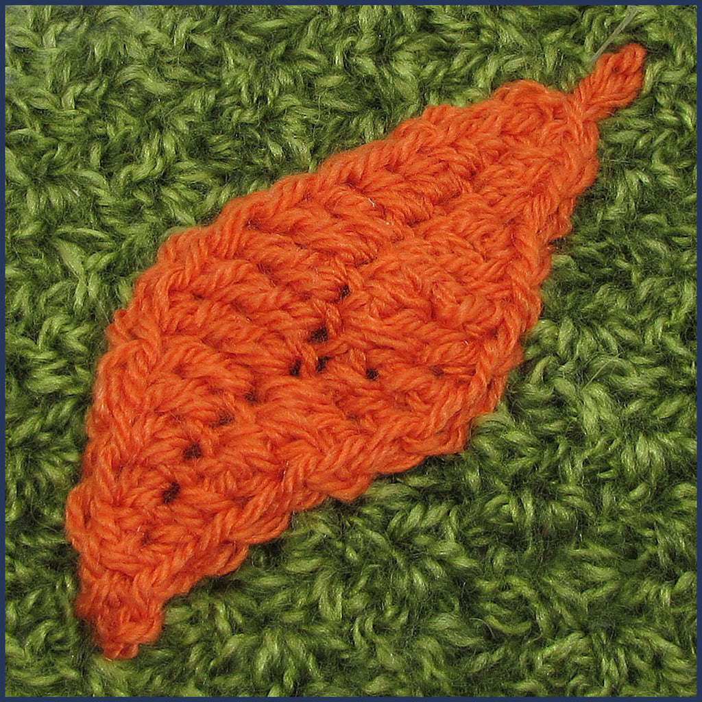 crochet leaf motif on a cushion cover