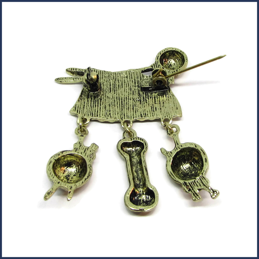 reverse of sweater knitting pin badge