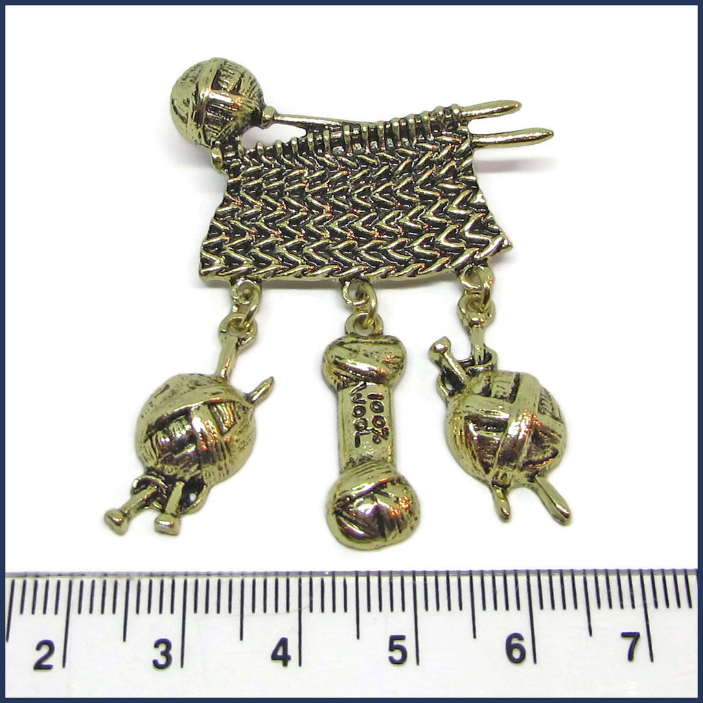 sweater knitting badge pin with ruler