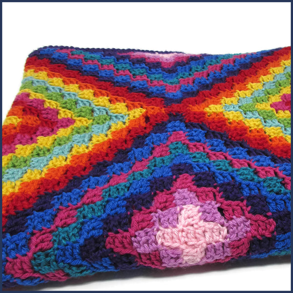 Mexican-inspired crochet blanket folded