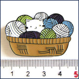 kitten in a basket of yarn badge pin with ruler