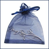 silver feather shawl pin/brooch in a blue organza bag