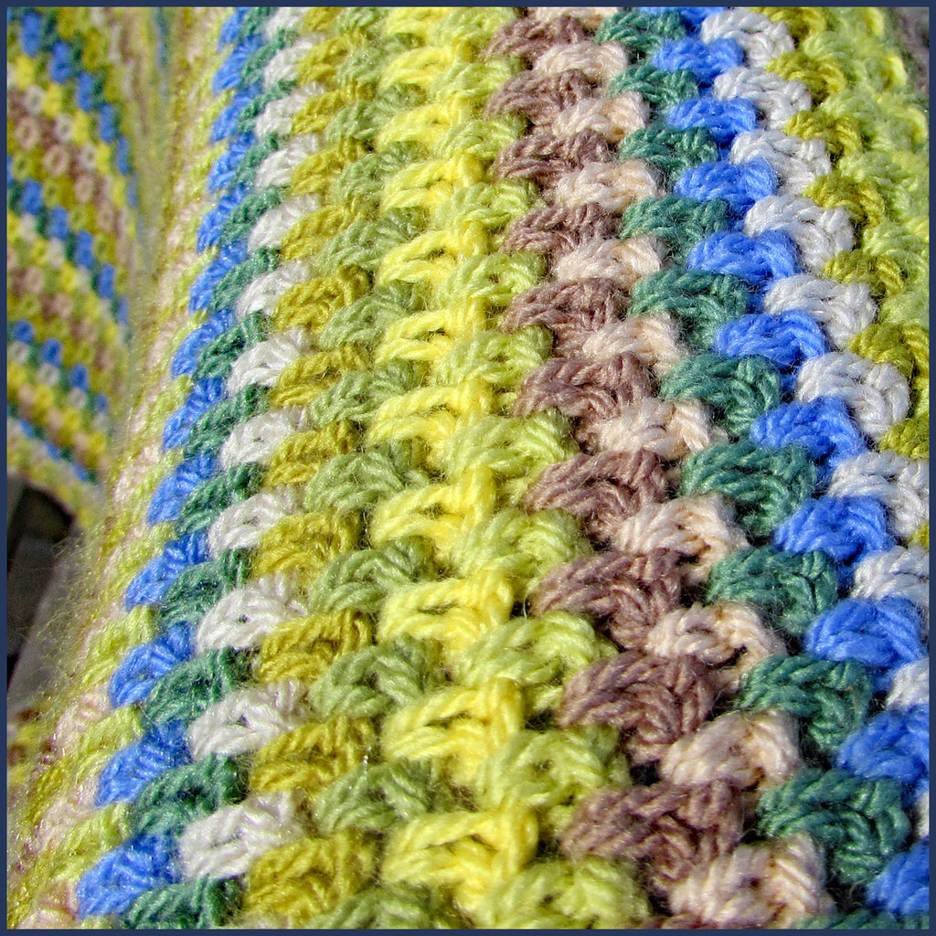 stripey crochet blanket folded