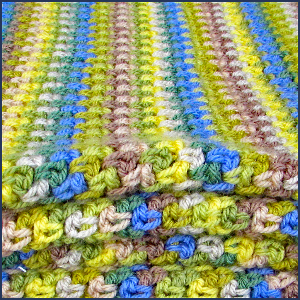 stripey crochet blanket folded