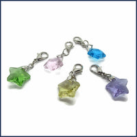 five glass star stitch markers 