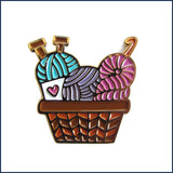 basket of knitting and crochet yarn pin badge